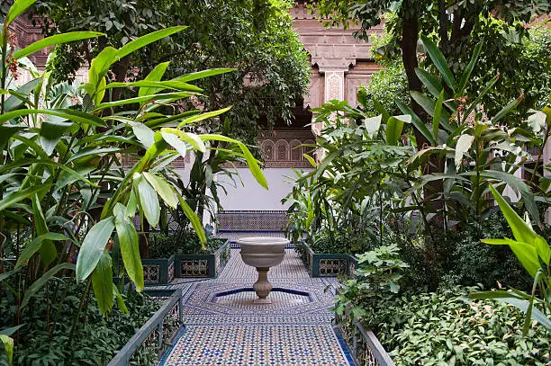 Bahia Palace courtyard with gardens and decorative arches, Marrakech
